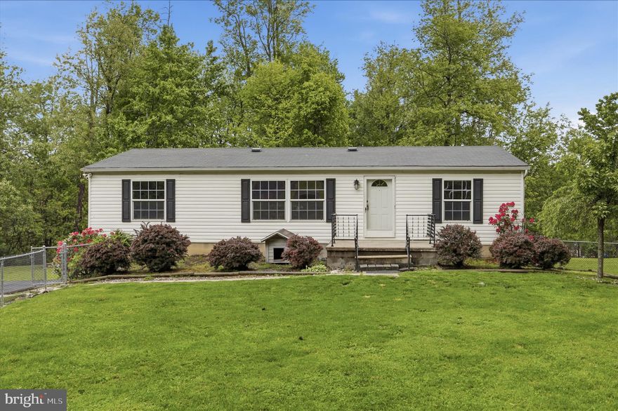 Enjoy the ease of single-level living in this well-maintained 3-bedroom, 2-bathroom home offering comfort, space, and peaceful outdoor views. The inviting layout features a spacious living area, functional kitchen, and comfortable bedrooms perfect for everyday living. Step outside onto the back deck overlooking the beautiful, spacious backyard — an ideal spot for relaxing, entertaining, or enjoying the included hot tub year-round.
The home also features central AC for added comfort, a paved driveway, detached 2-car garage, chain link fenced in yard and a full unfinished basement offering endless potential for storage, a workshop, home gym, or future finished living space. Conveniently located only minutes from Interstate 68 and the amenities of Frostburg including dining, shopping, and entertainment. A wonderful combination of convenience, functionality, and outdoor enjoyment!