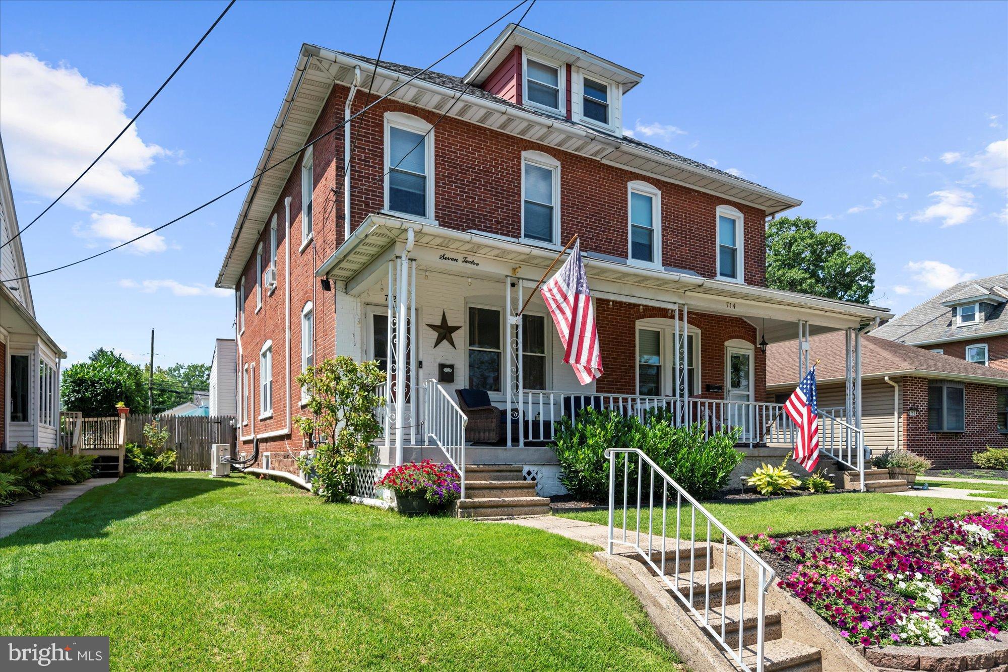 Timeless yet refreshed four bedroom home in the heart of Lansdale Boro Welcoming front porch leads into expansive living room with original hardwood flooring that carries into the open dining room as well. Convenient powder room, and bright kitchen with gas range, built-in microwave, dishwasher, new flooring, and access to the adorable level yard with pool (liner just replaced!), patio, garage, and fully fenced for privacy. The second level has a full bath and two well-sized bedrooms and main bedroom with built-in shelving and two closets, all with ceiling fans and carpet. The large fourth bedroom can be found in the finished attic. Efficient gas heat and hot water, detached garage with auto opener, characteristic beautiful wide baseboards and framed windows, ceiling fans throughout, all within the "West Ward" neighborhood, within walking distance to schools and downtown shops and restaurants. Open House on Saturday and Sunday, Aug. 2 and 3, however Seller reserves the right to accept an offer prior to the Open Houses!