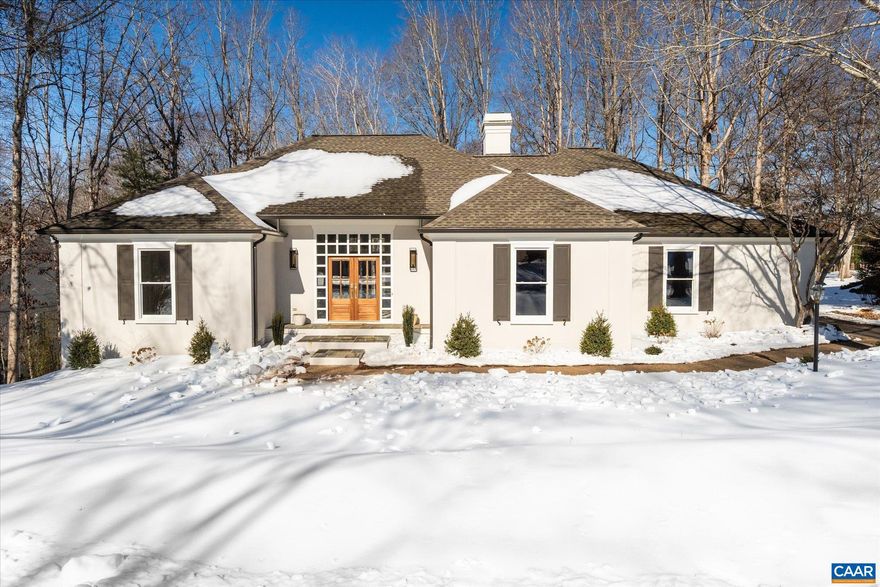 Experience refined main-level living in this gorgeous home located in the beautiful, mature original section of the Glenmore neighborhood. Perfectly sited on � acre with upgraded landscaping, this 5-bedroom, 4-bath residence offers the ideal blend of elegance, comfort, and modern updates.  Step inside to find white oak wood floors throughout and a thoughtfully reimagined interior. The custom-designed kitchen features bespoke cabinetry and stunning Le Blanc quartzite countertops, creating a bright and sophisticated heart of the home. The spacious layout includes a private library, ideal for a home office or quiet retreat.  The primary suite is a true showpiece with custom cabinetry, Aegean white marble countertops, and a luxurious zero-entry oversized shower for a spa-like experience. Generous secondary bedrooms and well-appointed baths provide space and flexibility for family or guests.  Enjoy outdoor living on the large deck overlooking the beautifully landscaped yard?perfect for relaxing or entertaining. This is truly a must-see home that combines timeless neighborhood charm with today?s most desirable updates.,Marble Counter