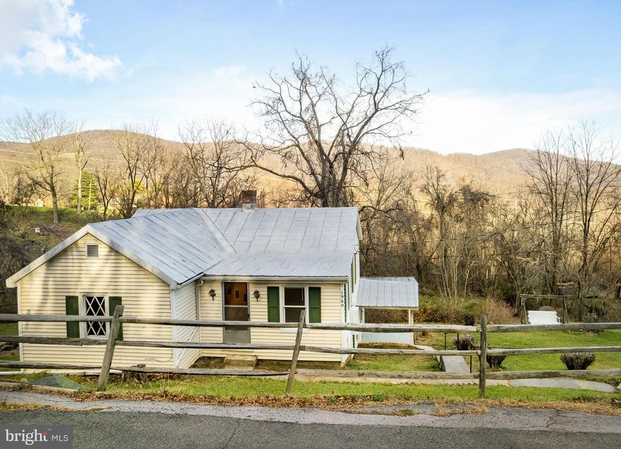 Mountain Views!  This charming farmhouse is nestled on a private unrestricted lot.  Features 3 bedroom and 1 bath. Seller has refurbished this property. 5 mile to Town of Front Royal.  Brand new septic system and updated electrical service to a 200 AMP.