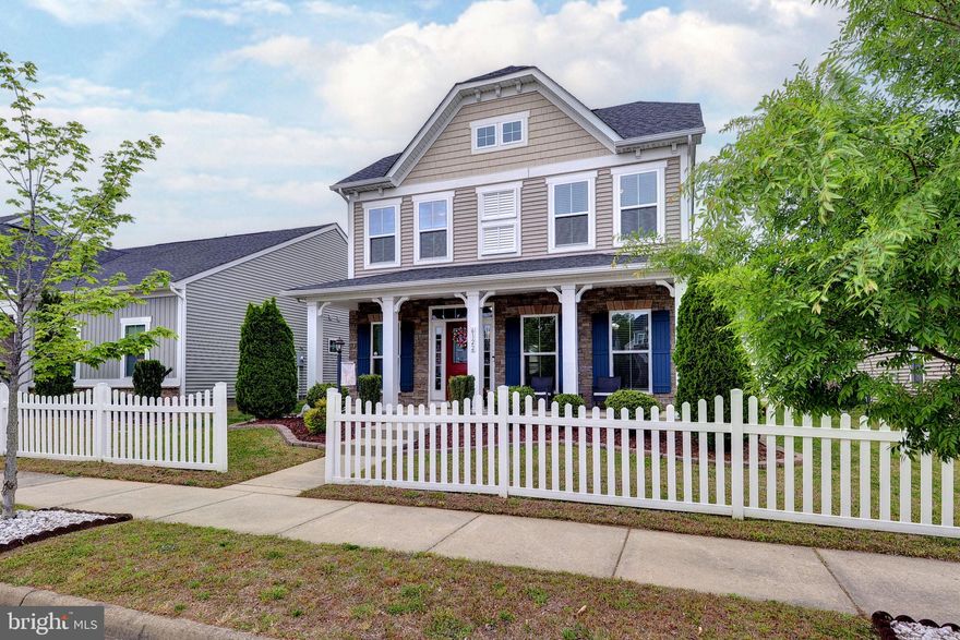 Welcome home to this bright and inviting Robert Frost model offering the perfect blend of comfort, style, and convenience. The open floor plan features a charming front office or flex space, spacious living area, and an upgraded white kitchen with granite countertops, stainless steel appliances, and great flow for everyday living and entertaining. Upstairs offers four well-sized bedrooms and two full baths, while the oversized two-car garage provides excellent storage and function. Enjoy a fully fenced, generous backyard with a cute patio perfect for grilling, relaxing, or play. Ideally located with the local school bus stop across the street and neighborhood amenities including a playground, picnic area, and sports field. Just minutes from I-64, Colonial Williamsburg, shopping, dining, and an easy commute to both the Lower Peninsula and Richmond.