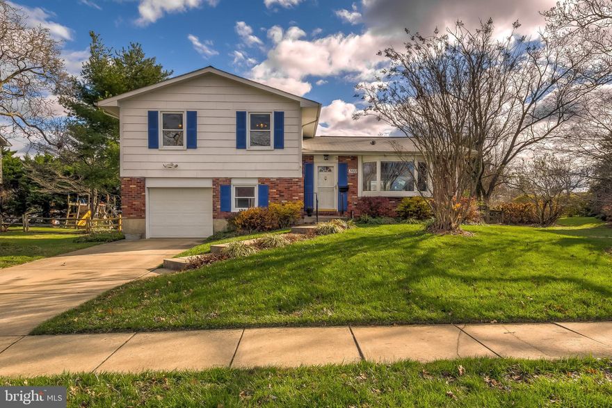 Beautiful, freshly-painted 4-bedroom, 2.5 bathroom split-level on a large level lot in the highly desirable community of Coachford.  Features include:  Open floor plan in living/dining rooms, bay windows for plenty of natural light, solid oak cabinets in the custom eat-in kitchen, remodeled bathrooms, hardwood floors, family room with fireplace, and a new roof (2010).  Plus, several updates to save money on your utility bills:  Tankless hot-water heater, double-pane windows, electric car charger in the garage, and solar panels that you will own (not leased!).  You and your family will enjoy the butterfly gardens in the fenced backyard while relaxing in the large custom 3-season veranda.  Walk to Pot Spring Elementary, Dulaney High, and Springlake Swim Club.  You need to see this gorgeous home!