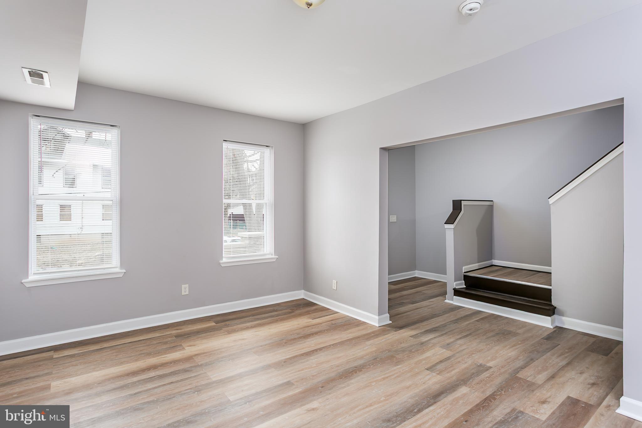 Welcome to 3021 Wolcott Avenue, a charming residence nestled on a quiet street in the desirable Forest Park neighborhood of Baltimore. This thoughtfully designed home offers over 2300 square feet of finished living space, featuring spacious interiors and modern updates that cater to your comfort and style.
Step inside to discover the stunning new floors that flow seamlessly throughout the home. With five spacious bedrooms and two modern bathrooms, this property is designed to accommodate your lifestyle needs, offering ample space for family, guests, or a home office setup.
Enjoy the comfort of central air conditioning and the convenience of a washer and dryer, to be installed before you move in. A highlight of the home is the large fenced-in backyard, perfect for outdoor gatherings or simply enjoying a peaceful afternoon. A massive fully-finished “Club Basement” provides an enormous living space for relaxing, socializing, and entertaining.
Positioned with easy access to Hanlon Park, Forest Park Golf Course, and Gwynns Falls Park, this location also offers a vibrant lifestyle with plenty of shops and restaurants along Liberty Heights Avenue. Certified lead-free, this home ensures safety and peace of mind for its residents. Come experience the blend of tranquility and accessibility at 3021 Wolcott Avenue.
Voucher’s welcome. Rent and security deposit payments must be made electronically through platform of landlord’s choice. Rent-spree tenant screening required.