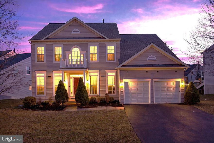 Discover an exceptional blend of comfort, style, and functionality at 2182 Oak Forest Drive, a stunning property perfectly situated in the heart of Ellicott City, MD. This stunning home is bathed in natural light, creating a warm and inviting atmosphere throughout. Step inside to a grand, two-story foyer that immediately sets a tone of elegance. Stately architectural columns and crisp crown molding perfectly frame the space, while an open wood staircase and a second floor balcony overlook draws the eye upward, creating a magnificent first impression. The formal dining and living areas serve as a showcase for superior craftsmanship, featuring striking architectural details, including soaring tray ceilings with elegant crown molding that adds incredible depth and character to the space. Cook and entertain in the beautifully renovated kitchen (2019), featuring sleek premium GE stainless steel appliances, a spacious island, elegant granite countertops, and ample prep space. Adjacent to the kitchen is a sun drenched family room with tray ceilings, this space is framed by expansive, oversized windows with elegant upper transom windows that draw the eye upward, maximizing the ceiling height and flooding the room with brilliant natural light. The main level also features a large office, a generous mudroom, and a convenient half bath. Upstairs, you'll discover a bright, open, and airy layout that boasts four bedrooms alongside a highly convenient bedroom-level laundry. The luxurious primary suite includes an en suite bath with exquisite tile work, dual vanities and a spa-like ambiance. The oversized primary bedroom serves as a true peaceful oasis, complete with enough space for a cozy sitting area and two massive walk-in closets equipped with custom built-in inserts (2023). Head downstairs to find a versatile, fully finished basement, newly refreshed with plush new carpet. The lower level provides endless possibilities with its expansive living area, bonus room, a full bath, two storage rooms, with direct walk-out to the backyard. Your outdoor living space is a true private retreat. The expansive, low-maintenance composite deck provides the perfect vantage point to overlook the serene yard while hosting weekend barbecues or enjoying a quiet morning coffee. Step down to find an additional patio underneath the deck, seamlessly extending your entertaining space (2021). Beyond the patio, the private backyard offers endless possibilities for outdoor activities, gardening, or just soaking in the fresh air. The home also features a two car garage with EV charger (2024). This property is in an ideal location for shopping, restaurants, and commuting to both Baltimore and DC. Whether you’re hosting guests, working from home, or simply enjoying family time, this home offers the perfect layout to suit your needs. Don’t miss the opportunity to make this exceptional property your forever home!