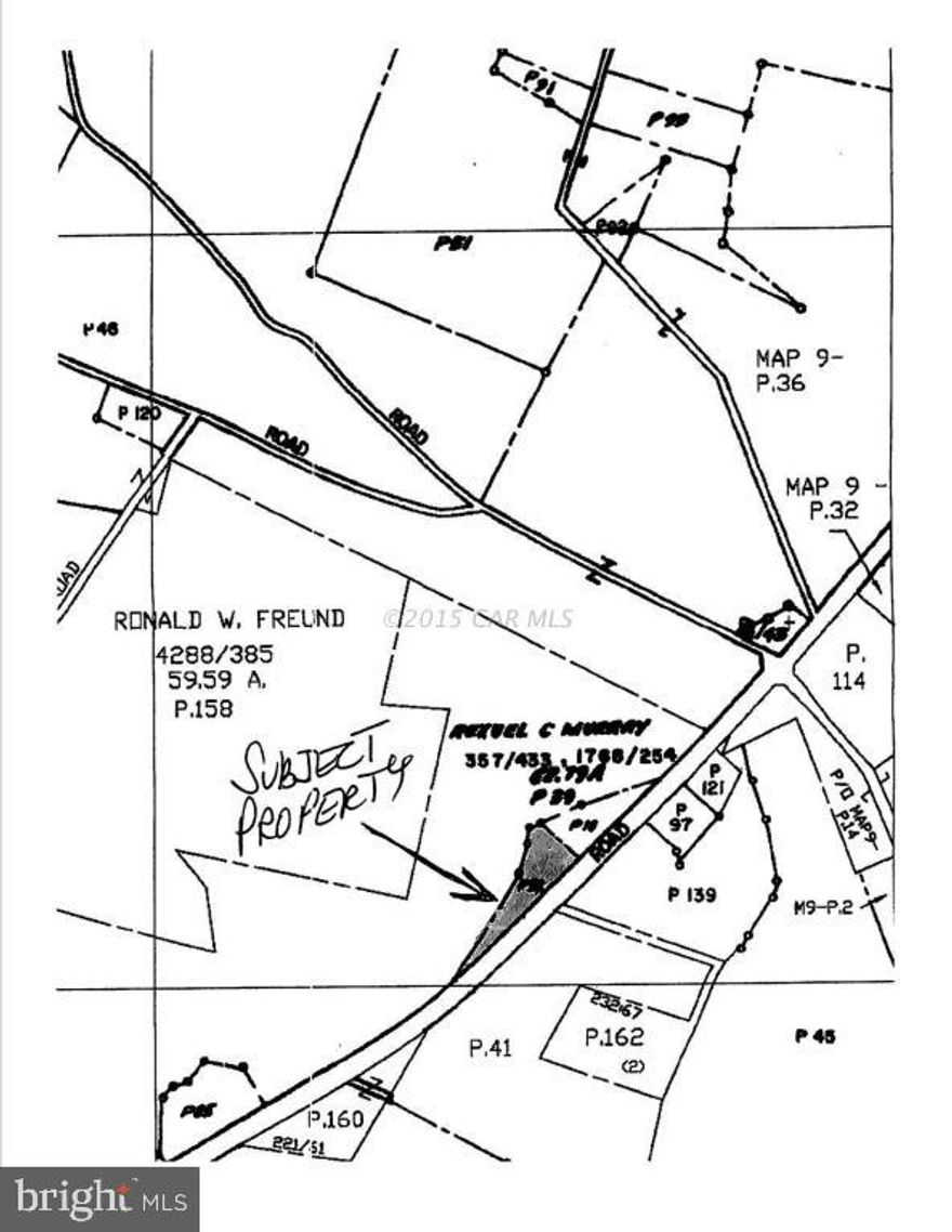 Two acre building lot improved by well and septic. Country living just fifteen minutes from shopping and the beach. It's the best of both worlds! Lots of potential for stick built or mobile home. Buildings currently on the land have no value.