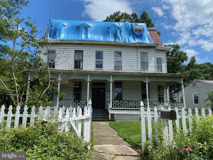 Original one of a kind 1890s farmhouse with 5 + BRs and 2 BAs, FP, dining room, wrap front porch, 2nd kitchen /potential in law suite and more. This property needs lots of work, especially on the 3rd floor and is on the historic register. If you love old homes and want to restore it to its former glory ( was hit by a tree in a freak micro burst storm 2022) this is the one for you! Lovingly owned by the same owner for the past 40 + years. An amazing opportunity to have a grand 1899 "Italianate" architecture home. The  rear exterior must be restored per historic guidelines,  permits and paperwork available with disclosures. Huge potential, great large rear yard, lots of original details. Some photos show its beauty before the storm...NO MORE SHOWINGS!!DO NOT ENTER**