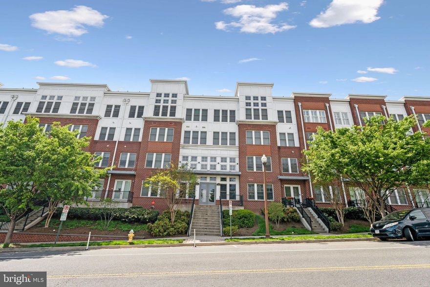 For those who refuse to compromise between vibrant city living and the luxury of space, this remarkable residence offers the best of both worlds. Nestled in the heart of Arlington  this expansive 2-bedroom + den, 2.5-bathroom condo is an urban sanctuary, boasting over 1,700 square feet of beautifully renovated living space and an enviable list of rare in-town amenities.

Fully renovated in 2020 with a meticulous eye for style and function, this two-level home welcomes you with an open-concept main floor that flows effortlessly from the gourmet kitchen to the living and dining areas, and then out to a spacious, private patio — perfect for morning coffee, al fresco dinners, or weekend entertaining. The luxury vinyl flooring gleams throughout, while the dedicated home office/den makes working from home a breeze.

The kitchen is a chef’s dream, outfitted with sleek quartz countertops, stainless steel appliances, a gas range, and a breakfast bar for casual dining. Upstairs, retreat to a luxurious primary suite with dual California Closets, a spa-inspired bath with dual vanities, and a separate soaking tub and walk-in shower that elevates your daily routine. A generous second bedroom and full bath round out the upper level.

But the luxury doesn’t stop there. Unique to this home are two private entrances — one from the serene courtyard, and another with direct garage access for the ultimate in privacy and convenience. This unit includes two covered parking spaces (a rare find in the city!) and an abundance of storage with two separate storage rooms and two sheds. Yes, that’s right — four storage spaces in total.

You're just steps from top-tier dining, shopping, parks, and Metro access, making it effortless to commute, explore, and indulge. Whether you're heading to work or heading out on the town, everything you need is just moments away.

Don’t miss this rare opportunity to own an oversized condo with the comforts of a suburban home — right in the middle of it all.