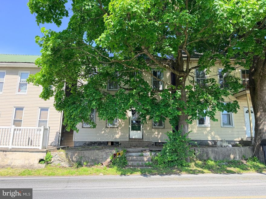 Calling all investors! Your next project is ready, a perfect blank slate with a solid/flowing layout and metal roof, new breaker box. Detached garage out back, with room to park in front of garage. **This is an as-is, cash sale for investors. Use caution when touring the property. Entry is at your own risk.**