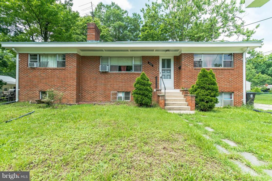 Craftsmanship abounds in this lovingly BRICK custom mid-century Rambler . Gleaming hardwood floors on main lvl, Philippine Mahogany shelves in Living and Dining Rms, Fireplace, eat-in Kitchen. 3 BRs upstairs. Lower level has large Rec Room with 2nd Fireplace . Great level private yard, minutes to shopping, Metro and more!