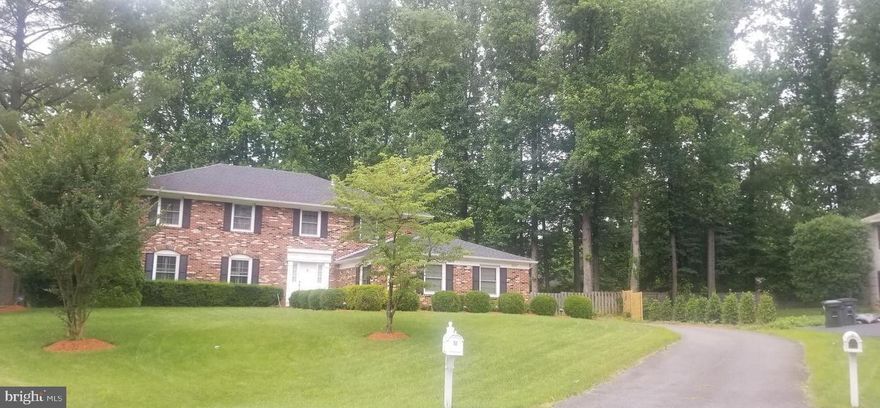 Beautiful and elegant true colonial home in McLean. This is a short term rental up to a year. Offered furnished at $6,500.00.  Prime location inside the beltway just off of Georgetown Pike on a cul-de-sac. The home boosts 5-6 spacious bedrooms and 4 full well appointed bathrooms and a powder room.  Five spacious bedrooms all with hardwood floors spread out from the foyer on the top level including the master with a huge walk in closet and large updated ceramic and granite finished bath with a soaking tub. The main level contains over-sized rooms all with hardwood, crown and shadowbox molding recessed lighting and a wonderful open circular flow. The large dinning room has french doors leading to the patio. An updated gourmet kitchen with a granite island can seat 6, and includes a wine cooler, breakfast eat in area, pantry, are all part of the many conveniences. Adjoining the kitchen is a sun room that opens to the patio or deck with a hot tub.  The kitchen is open to the family room with a gas log fireplace flanked by built-in bookcases. A study/bedroom is also on the main level with a complete laundry room.  The lower level has new carpet, a full bath, a large rec room and play area, plus a finished bonus room.  Several areas from the rear off the home lead to the deck with a hot tub and the very large, very beautiful flagstone patio ideal for entertaining with a Mediterranean trellis complete with grape vines.  Azaleas, hydrangeas and geraniums abound throughout the private level yard.  A garden area with a small greenhouse is located on the side. Exterior lawn and maintenance is included. Langley schools.