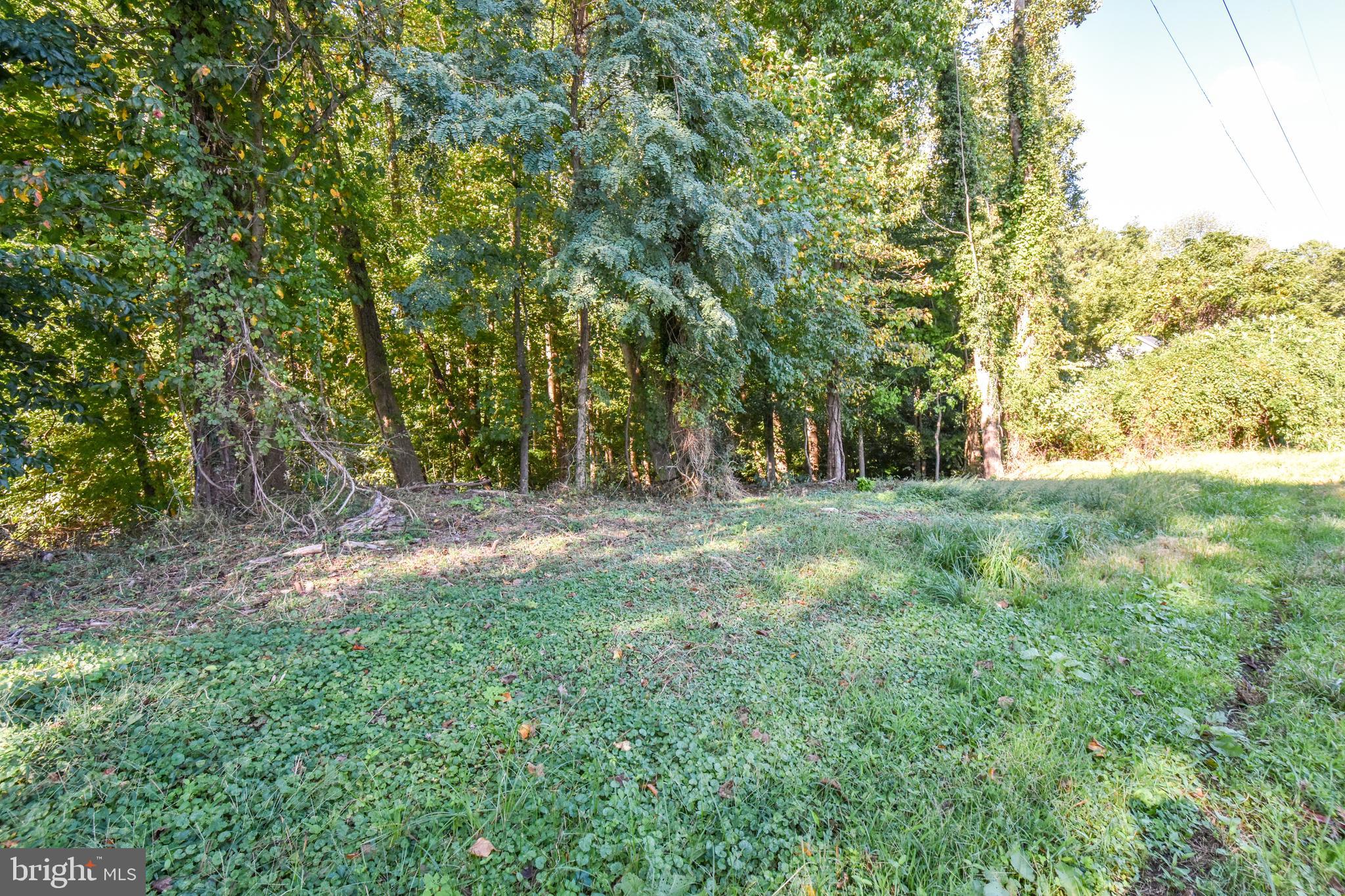BAY VIEWS!! Two lots being sold together for a total of 0.9 Acres. Build a two story home here to produce expansive views of the Chesapeake bay. Great setting with very well kept neighbors and only a short walk to the beach. Ask about pricing for a house package! Two lots being sold together for a total of 0.9 Acres. Valid perc test in hand!