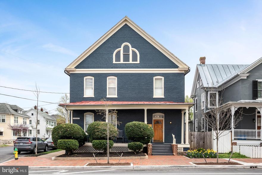 History Meets Modern Day

On the doorstep of Winchester’s Historic Pedestrian Mall a Modern Apartment awaits your occupancy.  This historic all brick building has been completely restored with gleaming red roof and perfect all brick facades, all dating to 1900.  Note the large front porch with inviting chic black rocking chairs.  Step back in to time in the shared foyer space, with period fine antiques, stained glass, a winding grand staircase, and chandeliers galore. Once inside apartment number 6, check the finishes and new stainless steel appliances in the kitchen, but also note the preserved original doors, hardware, and molding. The all marble bathroom is a delight!
Smartly designed with built-in storage space, this is the perfectly functional pad to access the lively  Downtown Historic Winchester.
Savor the quiet and light filled top floor unit with five original historic windows and high ceilings.  Start the day with coffee on your own private porch off of the bedroom — Then stroll down the newly perfected street scape as you head to the Winchester Historic Pedestrian Mall— JUST 2 MINUTES AWAY BY FOOT