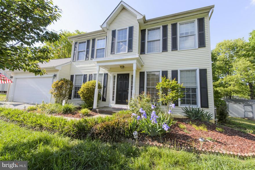 Move In Ready Colonial with an Oversized Family Room. Main Level Bedroom with a Full Bath. Hardwood, Granite Countertops, Title, New Paint,Cathedral Ceilings. Upgraded Lighting..Spacious Rooms and a 2 Car Garage!! Large Deck and a Fenced in Backyard..  This is a must See!!