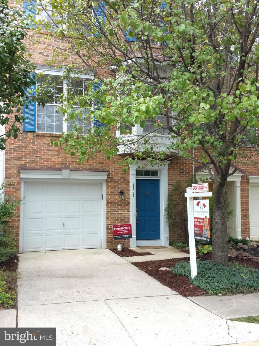 Vacant, show anytime! COMPLETELY redone inside! New everything; paint, carpet, stainless steel appliances, ceramic tile and granite counter tops in kitchen, light fixtures, ceramic tile and vanities in full bathrooms! This 3 bedroom 2 full 2 half bath town home is just stunning! Open floor plan and large bedrooms! Walk to shopping! Don't miss this one before it's gone!