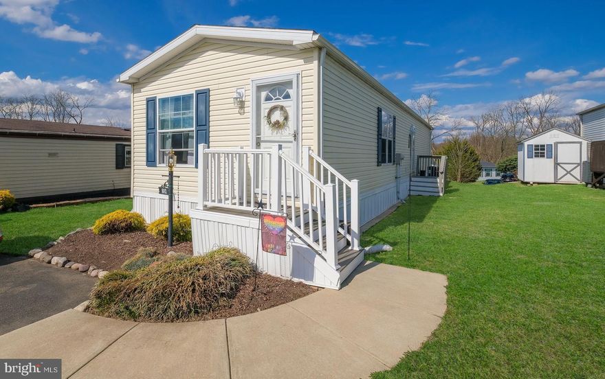 Better than new--absolutely beautiful and in excellent condition! The pictures speak for themselves. This is an active adult community offering a brand new community room with covered balcony that overlooks the inground pool. Weekly shuttle service, cozy library, game room and workout room with state of the art equipment.  So much more to offer--this property is a must see! Make your appointment today!