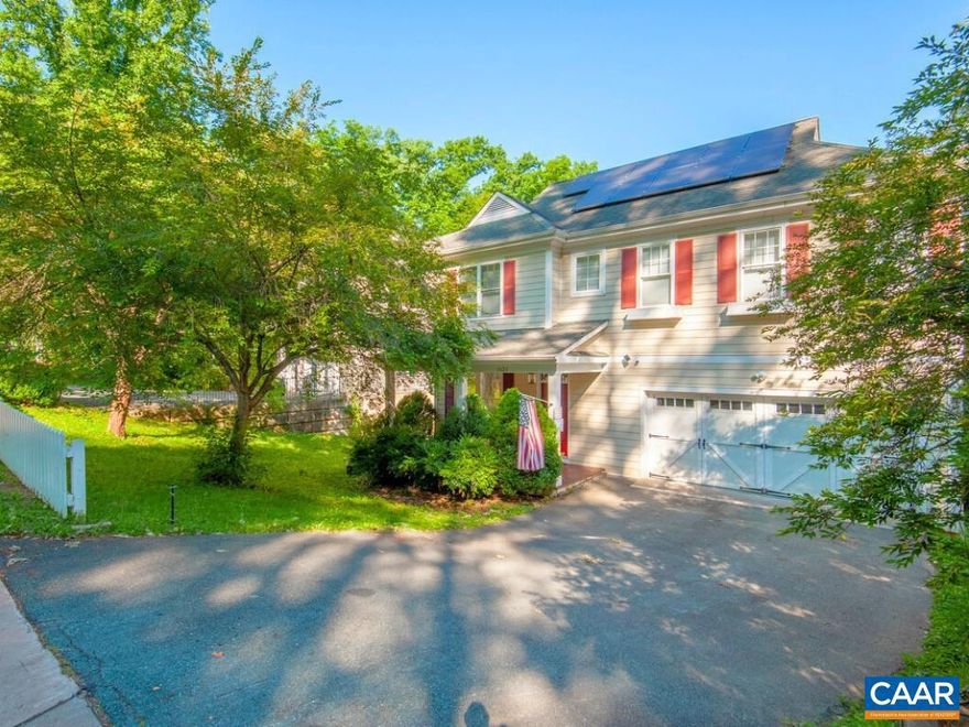 BEAUTIFUL 4 BR/3.5 BA HOME IN MEADOWBROOK HEIGHTS NEIGHBORHOOD! Just minutes from downtown Charlottesville, UVA, and the Shops at Stonefield, this home offers the perfect blend of comfort and convenience. The open-concept living and dining area features hardwood floors and large windows, creating a bright and inviting space. The updated kitchen boasts granite countertops, stainless steel appliances, and ample cabinet space, as well as a butler's pantry and a large island.  The primary suite includes an ensuite bathroom with a double vanity, a large tub, and a walk-in shower. Two additional bedrooms share an updated full bathroom. The expansive terrace level features an additional bedroom & full bath, plus a rec room and a den. The landscaped backyard with a patio is an ideal space for outdoor living. The home has many high-performing features, like solar panels, Energy Star appliances, and a dual fuel HVAC. Located in a quiet neighborhood close to Greenbrier Park's walking trails and playgrounds, this move-in-ready home is a must-see.,Granite Counter,Wood Cabinets,Fireplace in Basement,Fireplace in Great Room