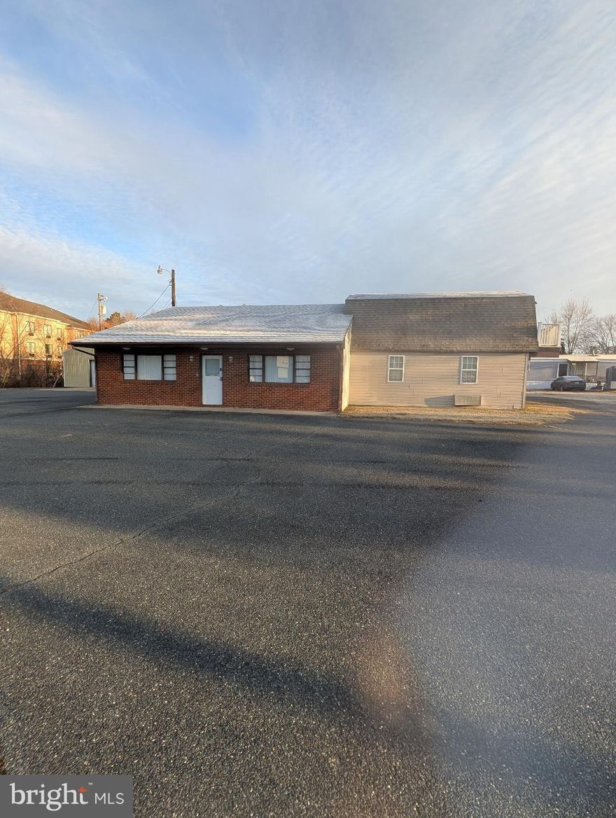 2.2 ACRES OF PRIME COMMERCIAL REAL ESTATE ON RT 50! THIS OFFERING CONSISTS OF TWO METAL BUILDINGS THAT ARE 5,000 SQ FT AND 7,000 SQ FT, A 2B 1 BA MOBILE HOME THAT IS CURRENTLY RENTED, A STORE FRONT BUILDING WITH OFFICE SPACES AND A TON OF PARKING IN THE FRONT AND REAR LOT. SELLER HAS A FEASABILITY STUDY TO ADD SELF STORAGE UNITS IN THE REAR LOT.
