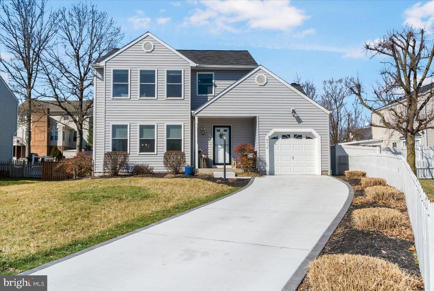 GORGEOUS 3 Bedroom 2.5 Bath COLONIAL in Nottingham:  Features Include: Beautifully UPDATED kitchen with GRANITE countertops, backsplash, island and stainless steel appliances, GLEAMING hardwood floors * Built ins * Crown molding * Chair rail *  Half Bath * GAS fireplace in the living room with sliders to a COVERED deck * On the UPPER level you will find a FABULOUS primary suite with vaulted ceilings, two additional bedrooms and a FULL bath * The LOWER level offers a SPACIOUS family room, exercise room, laundry and WALK out * COVERED front porch * Fenced yard  with Paver patio and fire pit area complete  the back yard * ONE car garage with  New MULTIPLE car driveway * This home is METICULOUSLY maintained and will not last long!  A MUST SEE!!