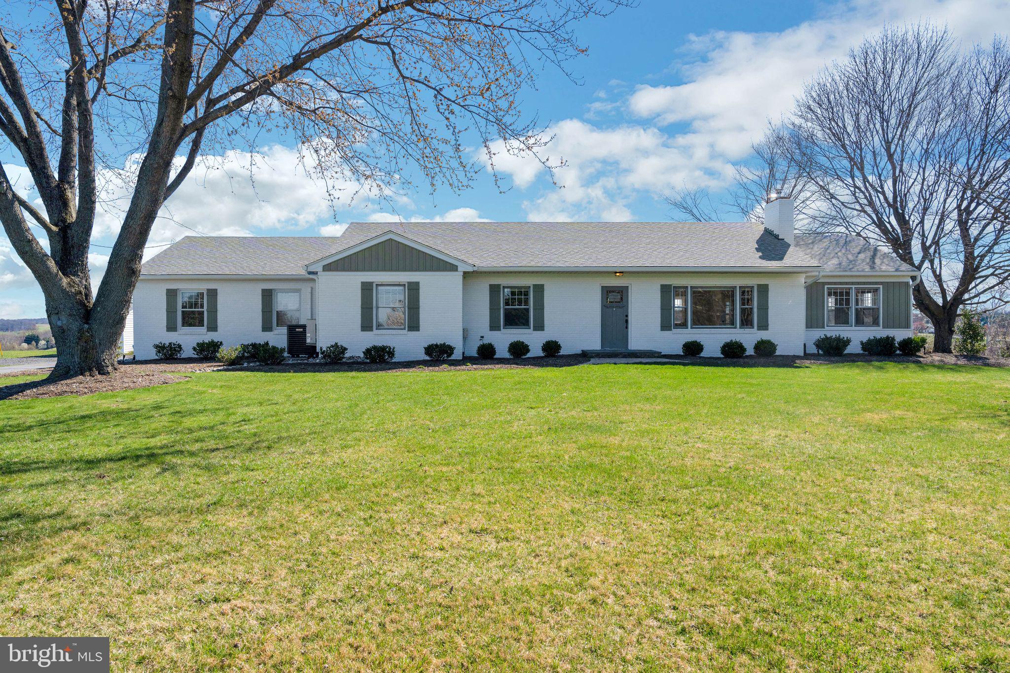 Stunning all-brink rancher situated on a private farm with some of the most picturesque panoramic views in all of Mount Airy. This renovated home features 4 bedrooms, 3 full baths, open-concept floor plan, updated kitchen with premium cabinetry, center island, granite counters and stainless-steel appliances, hardwood floors, recessed lighting, tons of natural light throughout home, 2 fireplaces (1 wood stove and 1 woodburning), great home office / sunroom, primary suite with private bathroom, all bathrooms have been recently updated, fully finished basement with large rec area, bedroom, full bath, tons of room for storage, walk-up entrance to backyard, 2-car attached garage with workbench and storage room. Recent updates in March 2024 include brand new HVAC system, entire home painted, all new trim, new shaker doors, etc.). Lawncare and landscaping included in rental price. Country living that is close to everything (all major commuter routes, downtown Mount Airy, New Market, Urbana, downtown Frederick, several grocery stores just minutes away, tons of restaurants, golf courses, parks, etc.).