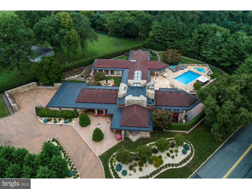 Is this the WRIGHT house for you? Located in the popular Rosedale area, this magnificent one of a kind masterpiece with an added touch of "Prairie School" architectural design made famous by American Architect Frank Lloyd Wright  is now ready for new ownership. Elegance and sophistication permeates throughout this truly classic stacked stone structure, with horizontal lines, grouped windows, large overhangs, courtyard with granite walkways, and numerous details not found in most other homes. This property is nestled on almost 2 acres of land, and showcases a well executed mature landscape, nurtured by a full irrigation system. This beautiful scenery can be appreciated both outdoors as well as indoors through the numerous windows located around the home. Entertainment is a breeze as the first floor offers spacious living room with a marble surround wood burning fireplace, large dining room with cannon barrel ceiling, gourmet kitchen with vaulted ceiling including 14 skylights, and other areas with plenty of elbow room to spare. The lower level footprint includes playroom, workout room, billiard room, media/entertainment room, and much, much more. Outdoors is fun and exciting with the large in-ground pool and spa accented by the surrounding patio laid with brilliant Tennessee crab orchard flagstone. A three car heated and air conditioned garage will keep your 4 wheeled beauties always looking their Sunday best. There are just simply not enough words to describe the numerous upgrades and intricate amenities that you must see and experience yourself to appreciate this impressive and elaborate domain. You truly will not be disappointed. Schedule your private showing today!
