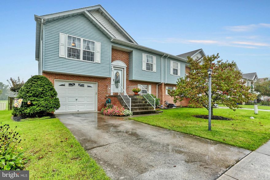You will love the open floor plan and vaulted ceilings in this gorgeous home.  Hardwood floors, updated kitchen with Quartz counters and tile backsplash,  Brand new roof in 2017.  Deck and paver patio overlook park with walking path to the rear.  Master bedroom with vaulted ceiling, walk-in closet & access to the bath.  Finished lower level family room could be spacious master suite with full bath and laundry.