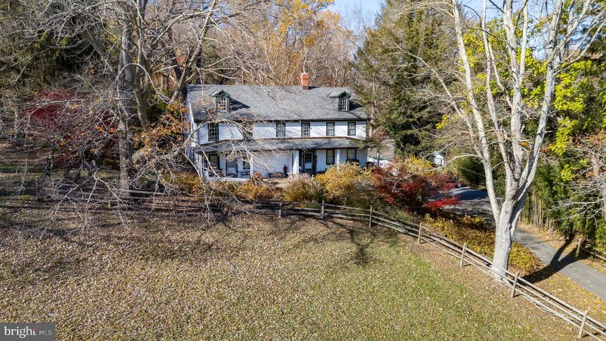 Tax Parcel 07-013.00-044:   Included in the price are the two adjacent tax parcel numbers 07-013.00-069 and 07-013.00-038 the total property consists of three residences, a studio and a barn on a total of 36.8 acres for a total price of $10,000,000. This charming Nineteenth Century farmhouse, owned by the original Thompson Family is on its own 2.33 acre tax parcel. Formally used as a duplex, the house has been opened up for added space and versatility. There are multiple rooms that could be used in any number of ways. The current resident utilizes one side of the home and uses the other only when they have visitors. That space includes a formal living room and family room. There is a large eat in updated kitchen that overlooks the private backyard with granite countertops, a pantry and loads of cabinets for storage. There is also a door that leads to the outdoors. The door in the kitchen leads into a smaller older second kitchen. Off this kitchen is a mudroom and laundry room. Up the stairs there are 4 bedrooms and 2 full baths. One bedroom is slightly larger than the others and all have good closet spaces. One bedroom has a walk up attic space for added storage. Both bathrooms are in good condition and offer good space. The basements in both sides are usable as extra storage. Charming features of this property include a large front porch, deep windowsills, a 2 car detached garage, a Spring House that has been cleaned and repointed and a small pond and brook below the front porch. Includes the sale of tax parcels 07-013.00-069 and 07-013.00-038.