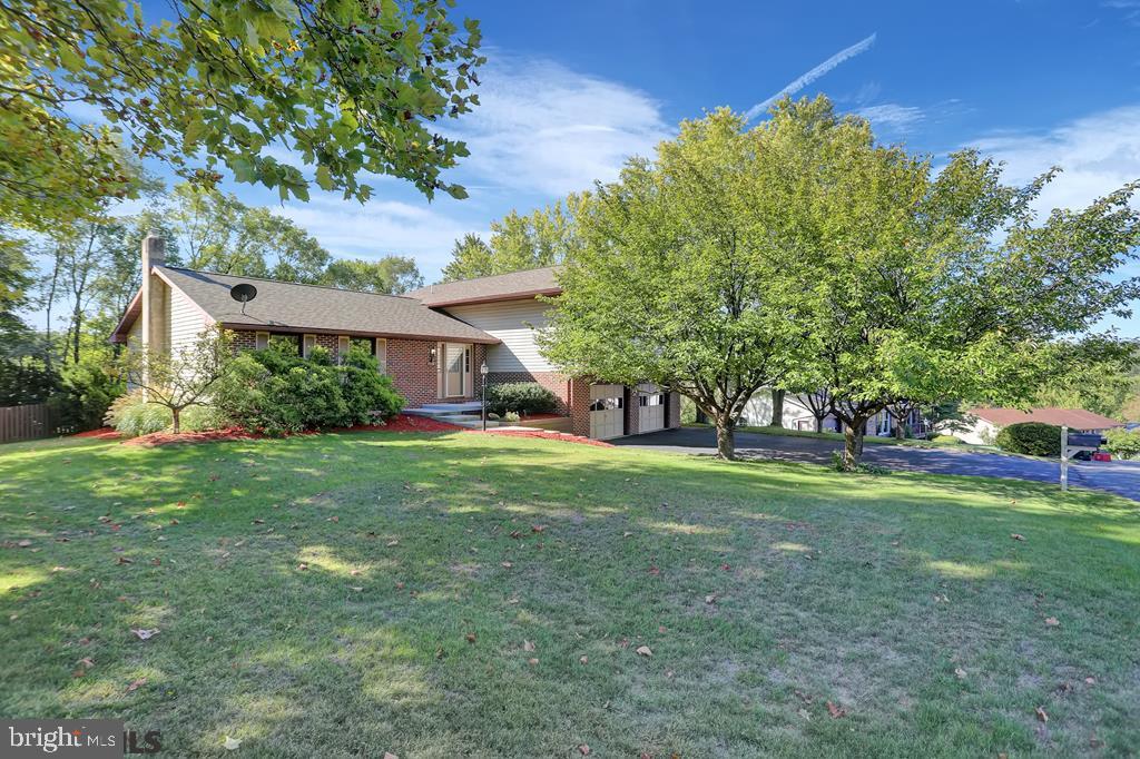 Nestled in Parkview Heights, this thoughtful floor plan features 3 bedrooms, 2.5 baths, and over 2,400 square feet of living space. The sun soaked main floor boasts a spacious kitchen with ample cabinet space, a formal dining area and a fantastic family room. Wind down from a long day in your 3 season sunroom that leads out to the private fenced in backyard. Head upstairs to find the owners bedroom complete with an ensuite, two additional bedrooms with large closets, and a full bathroom. Additional highlights: the roof is only one year old, mini-split on the 1st floor is 3 years old, the water heater and front steps were replaced in the last 4 years. This home is located just minutes to schools, Historic Bellefonte, and I-99. Don't miss this cozy home!