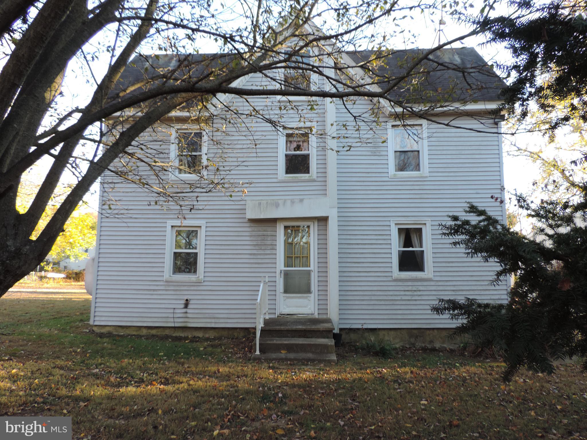 Home offers three bedrooms and two baths with a large detached garage. The home is located privately back off the road with no traffic. There is a third floor staircase in the upstairs bathroom. The home does need some TLC; but, with some updates would surely offer pleasant living. Conveniently located just minutes from Chestertown and Middletown as well as marinas and public beach. Selling as is.