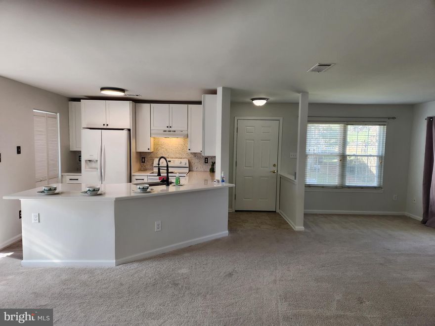 Move-in ready.  New carpet, baths upgraded. Kitchen upgraded. Perfect location, close to shopping, restaurants, grocery store.  Clean and fresh and ready for you to call home.