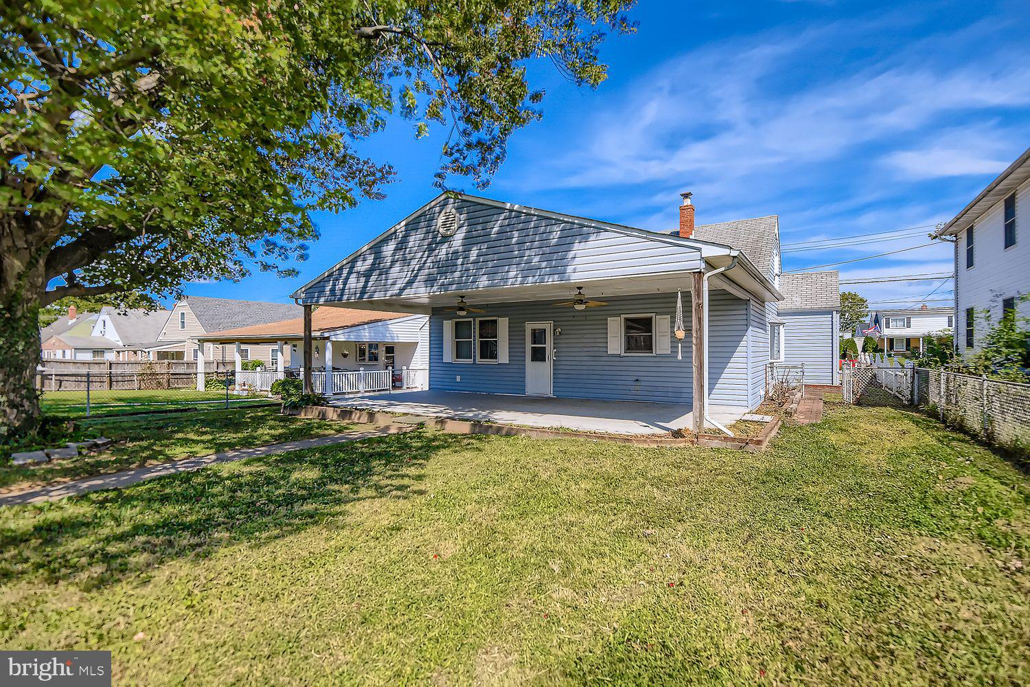 Spacious home with hardwood floors in the living room and dining room, a fenced in backyard for outdoor enjoyment, private 2-car parking pad, and bonus shed for extra storage. 3116 Sollers Point Rd has everything you need in a convenient location!