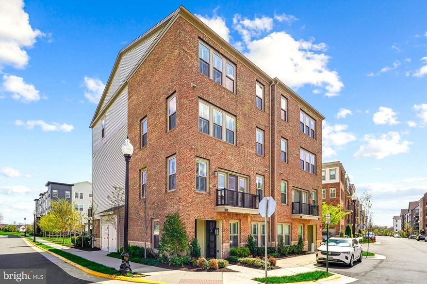 Welcome Home to Birchwood at Brambleton: A Luxurious 55+ Gated Community. Step into a world of elegance and comfort with this rarely available end unit 4-level elevator townhouse, where modern design meets serene living. Nestled within the prestigious Birchwood at Brambleton, this stunning residence is more than just a home—it's a lifestyle. Upon entering, you're greeted by a spacious living level that seamlessly combines style and functionality. The gourmet kitchen is a chef's dream, featuring top-of-the-line cabinets, exquisite quartz countertops, and ample space for culinary creations. It flows effortlessly into the bright, open entertaining area, perfect for hosting family gatherings or cozy dinner parties. Step outside onto your private balcony, where you can unwind and entertain while soaking in the tranquil surroundings. Whether it's morning coffee or evening sunsets, this space provides the perfect backdrop for cherished moments. Retreat to your lavish master suite, a sanctuary designed for relaxation. The spacious layout is complemented by a spa-like bath featuring premium finishes and a walk-in closet that caters to all your storage needs. Here, comfort meets sophistication, ensuring that you come home to a peaceful haven. The top floor boasts two generously-sized bedrooms, with its own spacious bath—ideal for visiting family or guests. With plenty of natural light pouring in through large windows, you'll enjoy breathtaking sunset views that are sure to impress. Living in Birchwood at Brambleton means embracing an exceptional lifestyle. The community boasts a luxurious clubhouse packed with features that cater to every interest. Dive into relaxation at the indoor and outdoor pools, unwind in the spa, or enjoy leisurely afternoons at the picturesque lake with its own pier. For the active lifestyle, explore scenic walking trails, or head to the state-of-the-art fitness center. Socialize with neighbors in game rooms, at the bar, or over a friendly game of billiards. With a cooking demonstration kitchen for events, various card groups, and engaging community activities, you'll have endless opportunities to connect and create lasting friendships. Experience the ultimate convenience with included home TV and internet services, ensuring that you stay connected with loved ones and the world around you. This is not just a property; it’s an invitation to experience a vibrant and fulfilling lifestyle within a community that truly cares. Don’t miss your chance to call this exquisite townhouse your home. Schedule a private tour today, and step into the luxurious living you've always dreamed of at Birchwood at Brambleton!