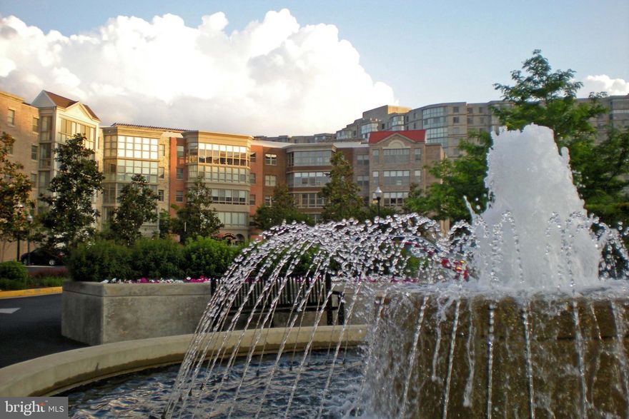 Welcome to Lansdowne Woods, a resort-style, gated community where activities abound from the ceramics room to the woodworking shop, to the indoor pool and gym. Enjoy an active 55+ lifestyle in this spacious two bedroom condo across from the club house and adjoining the Lansdowne Inn golf course. Savor the company of neighbors with coffee and tea in the common room downstairs where you’ll take pleasure in playing cards, puzzles and choosing books from the library. In this two-bedroom condo, both bedrooms and the open concept living room all have doors that open onto the huge, bright enclosed balcony. You’ll delight in the cozy, fully functioning, gas fireplace in your beautiful living room. The primary suite includes two walk in closets and a linen closet, as well as a dressing table with a second sink. Cook in your beautiful, bright kitchen with two wall ovens and all amenities. The large, in unit, laundry room conveniently has a wall of shelves. There’s plenty of storage here with many closets in the condo and a storage unit downstairs. Freshly painted with brand new carpeting, this space is move-in ready.