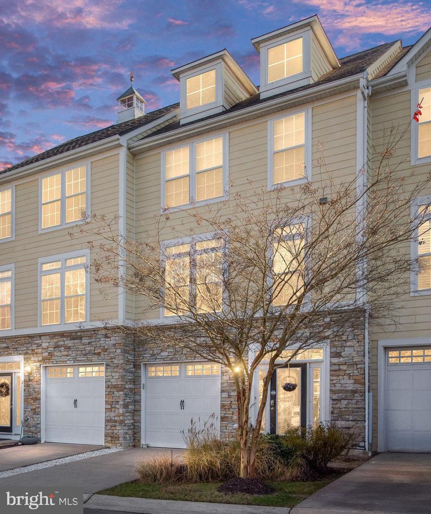 Don't miss the opportunity to own a home in the Monroe Bay Community! **WATERVIEW /  WATER ACCESS** This beautiful townhouse is in excellent condition and move-in ready. The home offers stunning water views from both the second and third floors, access to the bay, and a five-minute walk to the community dock and boat slips. *Newly paved roads throughout the community*

The townhouse boasts upgraded Hardiplank siding and stone on the exterior. The bay is accessible for powered boats, canoes, kayaks, fishing, sailing, and swimming. A private dock and boat slip are available for purchase or rent. Inside, the townhouse includes four bedrooms, three and a half baths, and a full kitchen with an island and breakfast area. 

On the main level, the kitchen opens to the dining area, which flows into the living room, and the sunroom, which features a door leading to the deck. The spacious design includes numerous windows that offer stunning views of the water. The primary bedroom, complete with a full bath and walk-in closet, is located on the upper level, along with two additional bedrooms and another full bath. 

The lower level includes access to the garage, a closet, a laundry room (with washer and dryer included), and a large family room or second primary suite bedroom with windows and access to the ground level. There is plenty of space for various floor plan options. The community features nice walking paths and areas for pets, and window treatments are included throughout the townhouse.
Recent upgrades include a brand new HVAC system with a 10-year transferable warranty. The kitchen, bathrooms, and laundry room have all been updated with vinyl plank flooring, while the rest of the interior rooms are carpeted in a neutral color and are in good condition. Additionally, the deck has pre-wiring for outdoor speakers.

The beach, restaurants, shops, and all other town amenities are accessible by golf cart. You'll enjoy the waterfront lifestyle and low-maintenance living. Fredericksburg is just 30 miles away, while Washington, D.C., and Richmond are approximately 90 minutes away.