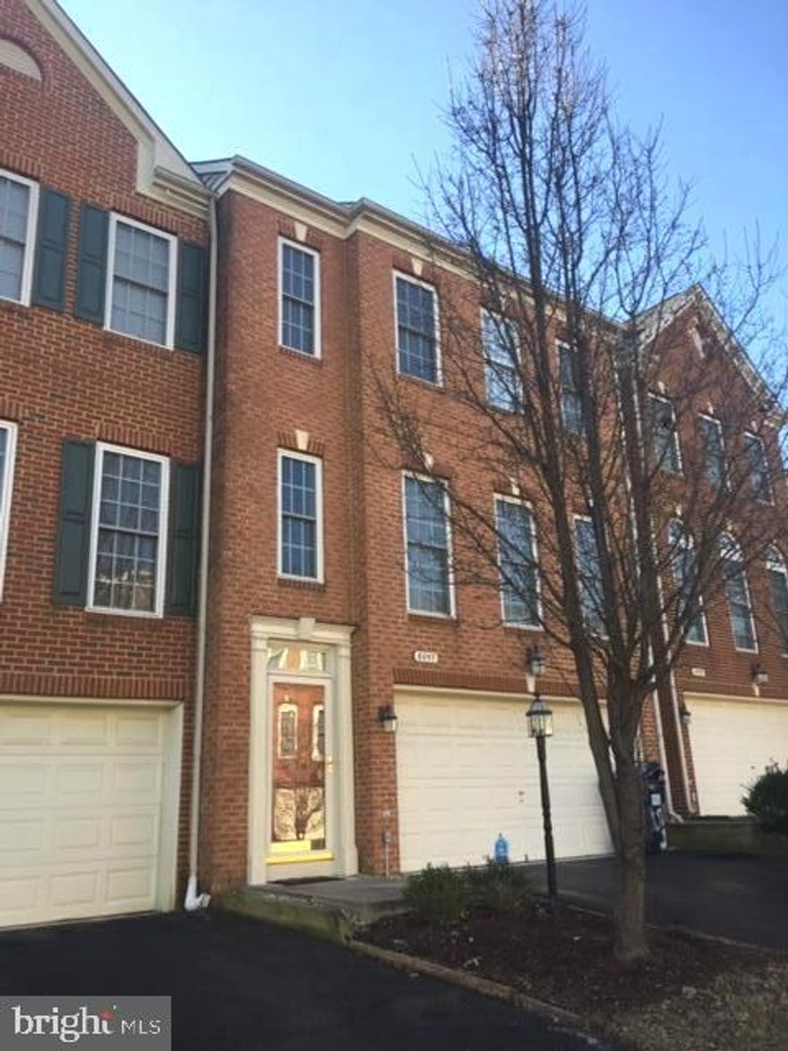 UPDATED, FRESHLY PAINTED & BRAND NEW CARPET TO BE INSTALLED JUNE 22,2022. A/C new (July 2021) & brand new hot water heater installed May 2022. Absolutely beautiful, bright & spacious townhome in sought after South County School district. Five miles from Ft Belvoir Hospital. Walk to Lorton Market Street shopping plaza with new grocery store opening soon, several restaurants, bank, medical offices and other services. You can also walk to Community pool & tot lot. Lots of visitor parking nearby. Huge MBR with ensuite bath with separate tub & shower, recessed lights, and large walk-in closet . Two additional good-size bedrooms also with recessed lighting. Upscale kitchen with Kitchen Aid stainless steel appliances, 5 burner gas stove, special granite and cherry cabinets. Tastefully selected updates. Eat-in area plus island, with spacious family room next to kitchen. Floor to ceiling windows. Walk out to newer(2018) composite deck. Hardwood on entry stairs, Living room and formal dining room. Spacious Rec room and powder room in "ground level basement" with walk-out to patio and fully-fenced spacious yard, as well as access to garage. This is it! Pet deposit fully refundable if no damage.