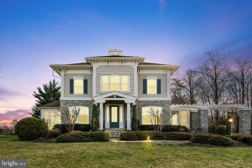 Nestled on a quiet cul-de-sac in Warrenton’s Silvermead at Vint Hill, this gorgeous 4-bedroom, 2.5-bath home offers a .31-acre lot with a fenced backyard and serene water views. The home boasts stately curb appeal with custom landscaping, stone and vinyl siding, a welcoming front porch, and a decorative pergola that spans over the driveway. Inside, the Inviting Foyer welcomes you with tray ceilings and gleaming hardwood floors ('25) that flow throughout most of the main level. The spacious Living and Dining Rooms feature custom mouldings and soaring tray ceilings. The Gourmet Kitchen is a chef’s delight, with 42” cabinets, a large center island, stainless appliances, and ceramic tile flooring. The Gourmet Kitchen flows into the sun-filled Breakfast Room, which is surrounded by floor-to-ceiling windows and features an atrium door conveniently leading to the front yard. Adjacent to the Gourmet Kitchen is the spacious Family Room, complete with a double-sided gas fireplace, a wall of windows with picturesque water views, and an atrium door that leads out to the backyard, providing seamless access to outdoor living. The main level includes a Private Study with hardwood floors, as well as a separate Command Center with additional cabinetry that flows into a Mud Room area with access to the 2-car garage. Upstairs, the Primary Bedroom retreat features a dramatic tray ceiling, large windows with water views, and a spa-like bath with double vanities, a jetted tub, a spacious shower with a seat, dual commodes, and an expansive walk-in closet. Three additional bedrooms feature spacious closets, and the updated Hall Bath ('25) includes trendy tile floors and a raised vanity. A convenient Laundry Room with new vinyl flooring ('25) and a washer/dryer completes the upper level. The gigantic unfinished lower level offers plenty of room for storage. Additional updates include: architectural shingle roof ('17), water heater ('25), garage door ('25), carpet in Living Room ('25), and fresh neutral paint ('25) in some areas.