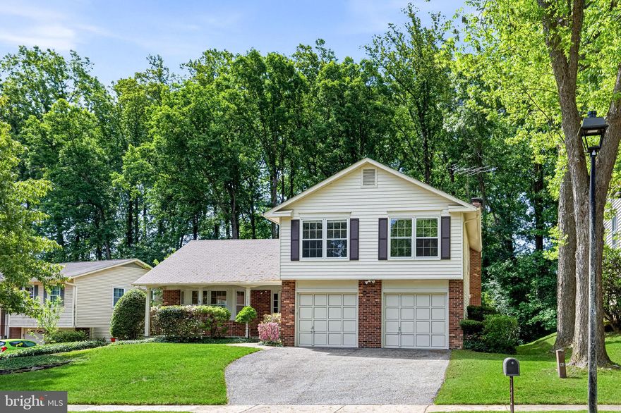 Expanded split-level home on a quiet cul-de-sac in the sought-after Longwood Knoll community. With more than 3,300 square feet of living space, this home offers an excellent floor plan and great flow throughout. The main level begins with a welcoming foyer that opens to the living room. The kitchen features abundant cabinetry, a breakfast area, and beautiful views of the private backyard. The bright and extended family room leads to the updated Trex deck and backyard, perfect for relaxing or entertaining. The upper level includes a large primary suite with a walk-in closet and a spacious bathroom featuring dual sinks, a separate shower, and a jacuzzi tub. Three additional generously sized bedrooms and a full bath complete the upper level. The lower level offers wonderful flexibility and can be used as a recreation room, playroom, home gym, media space, or home office, with plenty of storage options. An oversized two-car garage provides excellent parking and storage capacity. One-owner home, well maintained throughout. Unbeatable location just minutes from the Springfield Metro, Burke VRE, Burke Lake Park, Fort Belvoir, the Pentagon, and a variety of shopping and dining options. Easy access to I-95, Fairfax County Parkway, and I-495. Offers will be reviewed Tuesday, May 19 at noon.