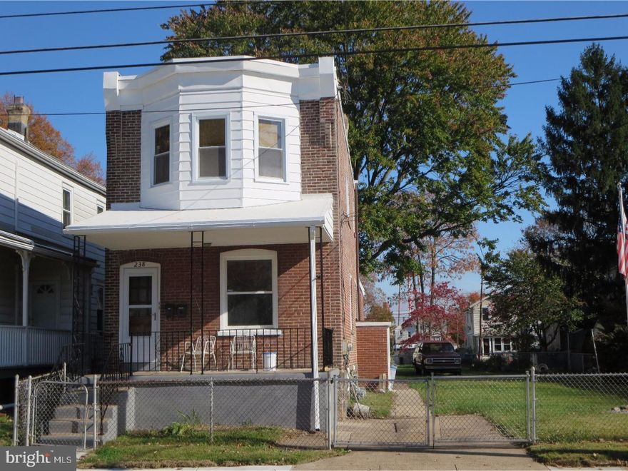Great brick Duplex with extra large, fenced lot.  Open front porch to common front door entrance.  First floor apartment offers a large living room, eat in kitchen,  2 bedrooms, mudroom, 1 bath, Outside exit to covered patio.  2nd floor apartment offers a large living room, 1 bedroom, 1 bath, kitchen.