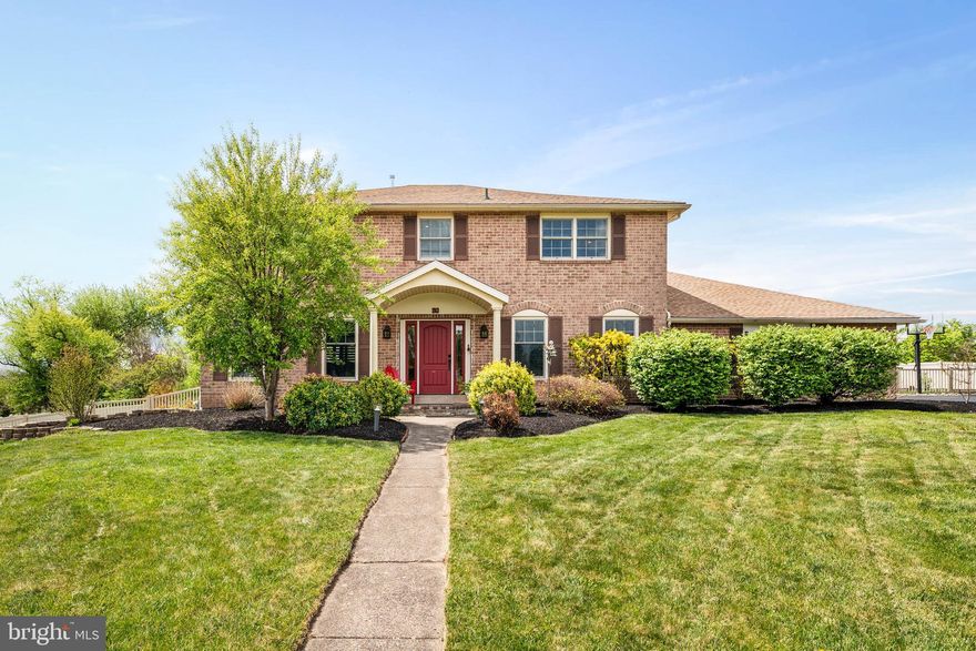 Welcome to a stunning Ambler residence that redefines modern elegance through a near-total renovation totaling over $467k. This expansive sanctuary features over 3,800 square feet of luxury above-grade complemented by an additional 1,079 square feet of flawlessly finished basement. Radiating the feel of new construction, the property is tucked away on a premier lot within a quiet cul-de-sac in the award-winning Upper Dublin School District. From the moment you step into the entry foyer, accented with custom wainscoting and wide-plank white oak engineered flooring, you are greeted by a symmetrical layout designed for both elegant entertaining and effortless daily living. To your right, the spacious dining room has been reimagined as a lively game room featuring shiplap walls and a custom-built bar, though it can easily transform back into a formal dining space. To the left, an expansive living room bathed in natural light features dual seating areas, a sleek gas fireplace, floating shelves, and a wood-beamed ceiling. Custom plantation-style shutters provide a sophisticated finish to the front-facing windows. Through glass-paned double doors, the magic flows into a luminous rear living area that offers ultimate flexibility. With its own attached full bathroom and individual HVAC zone, this space may be utilized as a home office, den, play area, or a private fifth bedroom/in-law suite. Direct access to the backyard makes it a perfect transition area for a future pool. The heart of the home is the large, modern eat-in kitchen featuring an abundance of refreshed cabinetry and newer stainless steel appliances. Daily functionality is maximized by a dedicated laundry and mudroom with an additional half bath, strategically tucked between the kitchen and garage. This area offers a separate entrance off the patio, ample storage, and a convenient laundry chute. The second floor serves as a premier sanctuary, boasting a complete remodel with continuous white oak flooring, new doors, recessed lighting, and upgraded insulation. The primary suite offers a peaceful retreat with two custom-fitted closets and a spa-inspired en-suite featuring marble flooring, a double marble vanity, and an extended glass-door shower. Three additional large bedrooms, all with custom closet systems and sensored lighting, share a stunning hall bath finished with a new tub/shower combo, full tile surround, and classic beadboard walls. For relaxation and entertainment, the professionally finished lower level includes new flooring, a reinstalled surround sound system, custom built-ins, and barn-style doors. This area is perfect for epic movie nights or game days. The outdoor experience is just as impressive, situated on a picture-perfect lot. The large, fenced backyard features a spacious patio for al-fresco dining, a dedicated separately fenced dog run with astro-turf, and a custom fire pit area. With plenty of level green space, there is ample room for a future pool. The infrastructure has been extensively modernized, featuring a new roof with hurricane clips, new siding, and Andersen Woodwright 400 Series windows throughout. The exterior is enhanced by new gutters with integrated lighting and a new steel garage door. Mechanics include an 80 percent replacement of the electrical system, a 220-line in the garage for EV charging, and a comprehensive HVAC overhaul with new compressors and rerouted ductwork. This allows you to move right in with the peace of mind that all major components are updated. Located just minutes from the vibrant shopping and dining of Ambler Borough, Maple Glen, Dresher, and Fort Washington, this property offers easy commuting via the PA Turnpike, Route 309, and SEPTA Regional Rail. Combining cul-de-sac serenity with unmatched modern luxury, this home is the perfect blend of suburban convenience and sophisticated style.