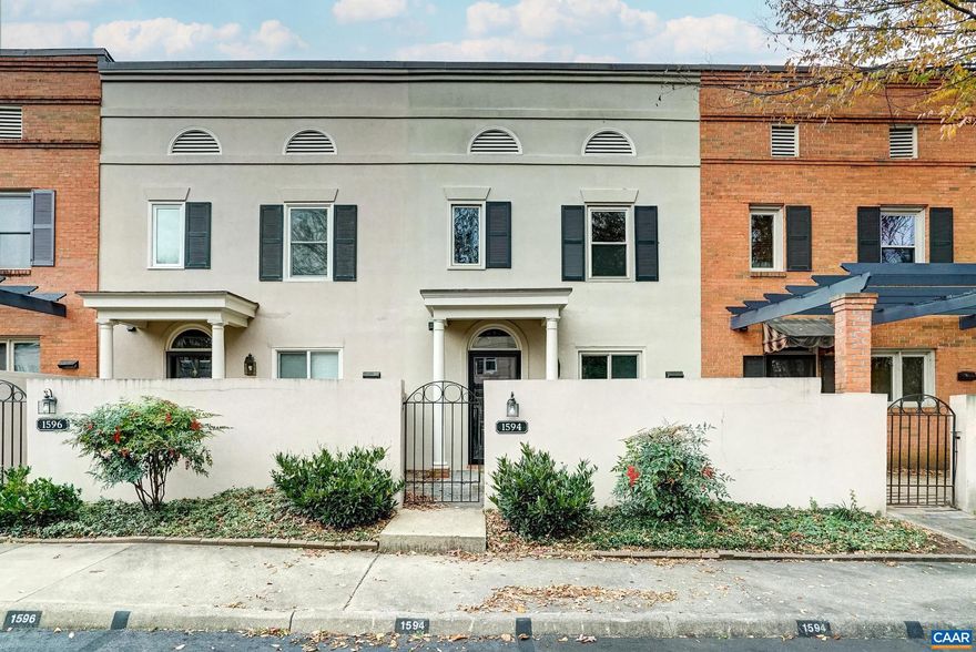 This charming Garden Court townhouse offers an exceptional value and private outdoor living! Enjoy two reserved parking spots directly in front, plus a private stone courtyard perfect for planters, play area, or morning coffee. The fenced backyard features garden space, a new deck, and hot tub (2019) for ultimate relaxation. HOA includes community pool access! This lovingly maintained home boasts major updates for peace of mind: new HVAC (2023), Quest plumbing replacement and hot water heater (2020), updated windows in kitchen, basement and primary bath (2021), and new skylights (2022). Fresh neutral paint and luxury vinyl plank flooring throughout create a bright, modern feel. The main level features a dining room with new lighting, living room with wood-burning brick fireplace plus an kitchen with updated range, dishwasher, microwave and water filter. Upstairs, two bedrooms each offer ensuite bathrooms. The primary features a large closet and tub/shower combo, while the guest bedroom includes a skylight-lit shower bath. The walk-out basement provides versatile rec room and office space with freshly painted floors, plus plus unfinished storage with laundry hookups! Additional features include whole house surge protector (2021).,Painted Cabinets,Fireplace in Living Room