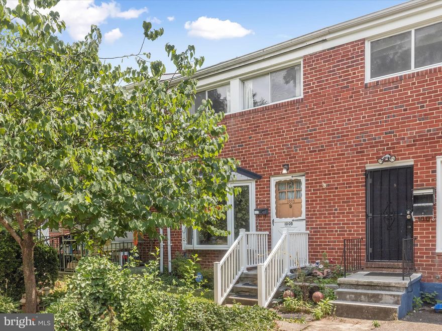 This three level townhome offers two bedrooms and two full bathrooms, combining comfort and convenience in a prime location. Inside, the main level includes a front room with a charming bay window and flexible space for living and dining, along with a spacious kitchen that features ample counter space and access to the backyard. Upstairs, you will find a generously sized primary bedroom, a full bathroom with a tub shower, and a second bedroom. The partially finished lower level adds versatility with a recreation room, second full bathroom, plus a large utility area for laundry and storage. Step outside to enjoy a peaceful backyard with lush landscaping, a patio for outdoor relaxation, a storage shed, and a private driveway with two parking spots. Situated just minutes from I-83, you’re close to an array of shopping, dining, and entertainment options. Some images have been virtually staged.