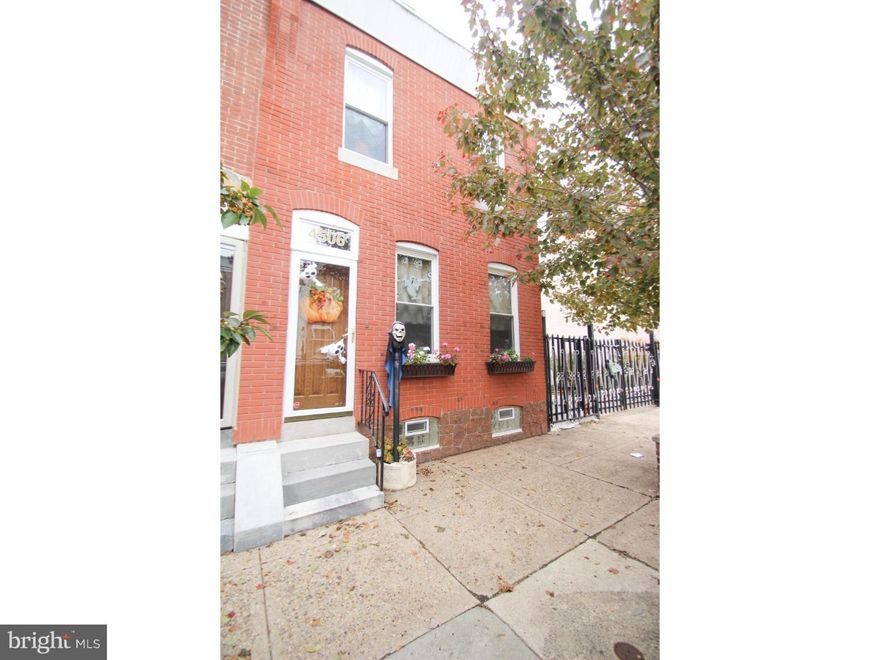 This 3 bedroom home featuring 2 full and 2 half baths marries classic charm and modern details to create a truly beautiful, charming home. The home welcomes you with a beautiful brick facade and classic transom door. Pass through and find yourself in a spacious open concept first floor with beautiful Chestnut hardwood floors that draw your eye past the stairs, featuring architectural details on each riser, past the gorgeous waterfall chandelier, to the kitchen featuring a trendy mix of luxe and distressed finishes. The granite counter tops play off the dark, modern cabinetry and gorgeous glass back splash. Just past the spacious kitchen is the sunny laundry/mud room with access to the back patio, yard and powder room. Venture down to the finished basement and you'll find the perfect space for entertaining with room for a pool table and full oak bar with seating for six, plus one of the two half baths. Upstairs, a beautifully appointed full hall bath is shared by two of the bedrooms, featuring a floating counter with marble counter top and dual headed shower. The large master suite includes a generous walk-in closet with teak shelving, and stunning master bath with his and hers sinks, marble finishes, glass tile detailing, and a spacious shower with three shower heads - including a relaxing rain shower head! The home also has dual zone HVAC, new plumbing (including a new sewer line from the street), Navien tankless water heater, all new appliances and a built in coffee center with water line in the kitchen. There is recessed lighting throughout and the home is pre-wired for sound and cable. Tax abatement in place through 2024.