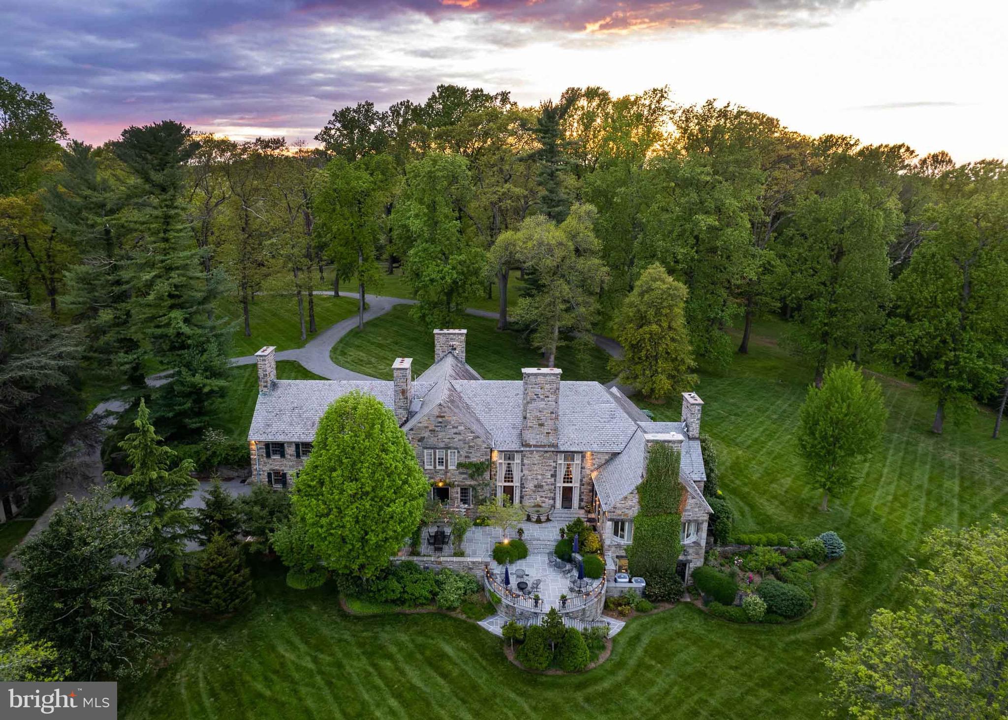 Live authentically. Magnificent stone estate tucked away overlooking Worthington Valley and beyond. Upper Melinda awaits perched on 235.00+/- acres. Commanding views of the valley complement the strength grandeur of this enduring architectural masterpiece. Relish the meandering drive home through lush woodlands. A sanctuary of tranquility and serenity. Crafted by acclaimed architect Louis McLane Fisher and adorned by the legendary Baltimore native, Billy Baldwin. Discover the whispers of Baldwin’s timeless touches lingering in dashes of red lacquer accents and smokey mirrors throughout. Within, nine roaring fireplaces beckon conversation and radiate comforting warmth. Main level owner’s suite. Transform your nocturnal journey as you gaze across the valley before falling into restful slumber. Your inner chef will flourish in the cooking space. Partake in lighthearted fun and competition in the basement game room. Original cork flooring embellished with exotic animal inlays; intact. Immerse yourself in the opulence of rich landscaping as you explore your outdoor haven. Savor the stillness and go for an invigorating round of laps in the sublime pool.. Recharge in the ambiance. An expansive stone terrace embraced by abundant greenery beckons for an elevated outdoor dining experience. Other worldly views that are hard to grasp. A palpable depth of wonder permeates. A sensory experience. Vistas that mirror paintings. Gaze over glistening ponds in the distance. Truly a living canvas from which to paint the next chapter of your life. A legacy property. 5 +/- miles of extensive trail network throughout the grounds. Revel in the extreme privacy. Indulge in the vast beauty that unfolds around you. Enchanting stone guest house recently renovated. Four income generating tenant houses convey that are unable to be divided. Cultivate your existence. The art of uniting human and home. Do not drive to property without an appointment. Property is subject to conservation easement.