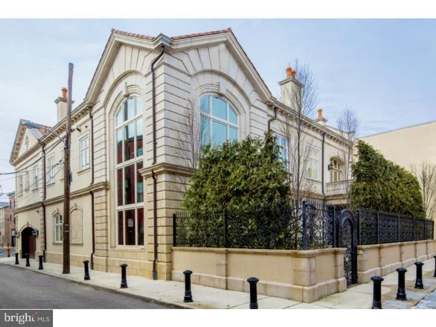 Gorgeous 10,000 sq ft custom built Mediterranean Villa in the heart of Philadelphia! This exquisite home was built with individually laid cast stone, a terra cotta tile roof and chimney with copper downspouts and features 4-car garage parking. The formal terrace/garden has a working fireplace, 8 person in ground Jacuzzi with fountains, landscaping complete with irrigation lines, lighting & surround sound. Enter the home to an amazing 2 story 30' grand foyer with Schonbek chandelier and floating staircase. Professional Chef's kitchen and Butler's pantry feature custom ribbon mahogany wood cabinets, Dacor duel fuel 6-burner epicurious range, GE Monogram appliances, Wolf Microwave oven, and warming drawer. Den/ guest bedroom have natural tiger wood floors and en suite full marble bath. Living Room boasts a custom mahogany wet bar, Honey Onyx wood burning fireplace, which is adjacent to formal dining room. Master bedroom suite has wood burning fireplace, motorized shades, two oversized walk in closets, lavish master marble bathroom with infinity tub, radiant heat floors, and oversized walk in shower. Media room/bedroom with ebony laquer oak floors and full gym. Lower level features fully finished basement complete with entertainment room. Wine Enthusiasts designed wine cellar that holds 370 bottles, oversized cedar closet, additional full bathroom. The home is a fully equipped smart home with Crestrom system, Inclinator 3 stop elevator, security cameras surrounding property, Sonus Faber speakers throughout, 3-zone central vaccum and more!