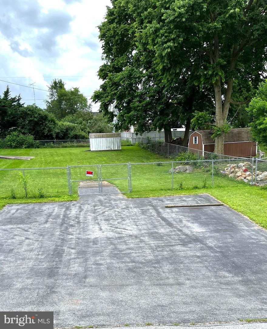 Partially fenced residential lot located just outside of the city limits.  No city taxes!  Back on the market.  No fault of sellers.