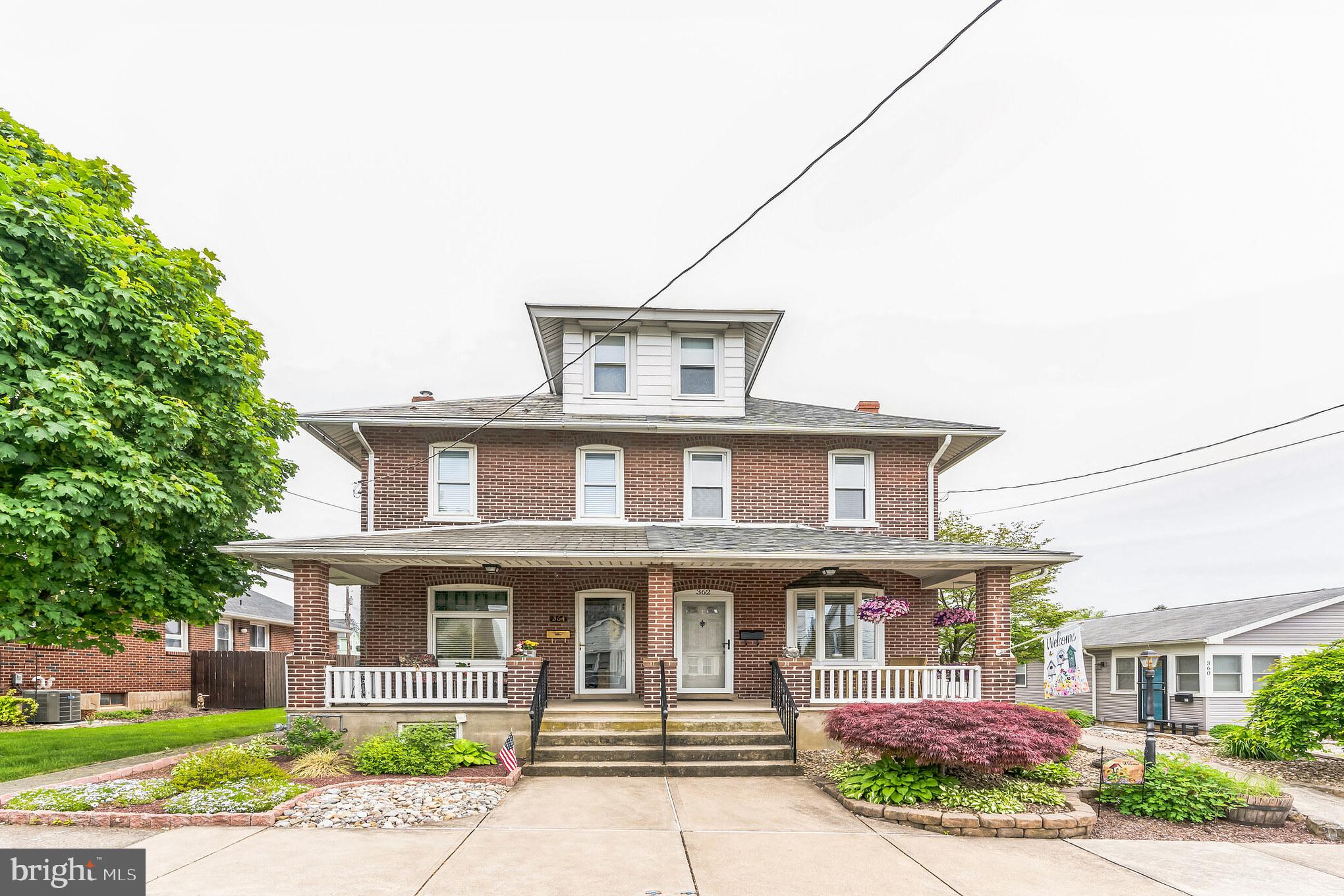 If you have been looking for an absolutely stunning and meticulously maintained solid brick twin in the lovely Northampton Borough, the wait is over!!!  This home has been beautifully updated and has so much to offer!  As you walk up to the front, you will immediately appreciate the gorgeous landscaping as well as the lovely covered front porch, the perfect place to enjoy a cup of coffee in the morning.  Once inside the spacious open-concept living/dining room combination will make entertaining a breeze with its newer carpeting, high ceilings, and bay window.  The lovely kitchen features plenty of cabinet space, new luxury vinyl plank flooring, white cabinetry, and recessed lighting.  Towards the back of the house is an absolutely gorgeous renovated bathroom.  A mud room completes this level.  The second floor features three good-sized bedrooms as well as a recently renovated hall bath that features all new fixtures and luxury plank flooring as well as a linen closet. The finished walk-up attic space is perfect for additional storage or possibly a play area for children.  The basement is finished and offers approximately 700 sq ft of additional living space and would be perfect for a recreational room, gaming, or family room!  The basement also features a wet bar, plenty of closets, a good-sized storage room, and a separate laundry room.  There is plenty of space to enjoy the outdoors on the huge patio with a beautiful pergola which overlooks the flat back yard!  Parking will not be an issue with the home's detached one car garage as well as a parking pad next to it.  Roof replaced in 2016, hot water heater replaced in 2022, central air replaced in 2016, 1st floor bathroom renovated in 2021, 2nd floor bathroom renovated in 2022, carpeting replaced in 2020, vinyl plank flooring installed in 2021, and all walls freshly painted in 2022!!!  This home is located on a quiet street but is close to plenty of dining and shopping options as well as within close proximity to the Blue Route.  Don't wait to schedule a tour of this amazing home!