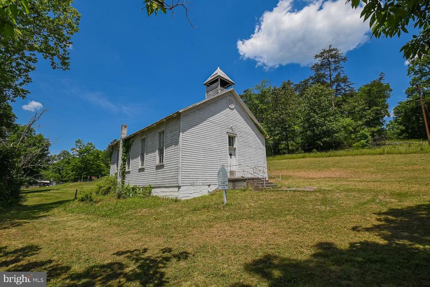 Re-listed at a better price with a brand new survey!
Don't miss your chance for this great, unique opportunity. Most recently the Markwood United Methodist Church. Just over 1 acre. Includes chapel and additional building, which would be great for events and gatherings. Conveniently located right along Route 50 near Burlington between Keyser and Romney. A lot of potential to restore these 2 structures!