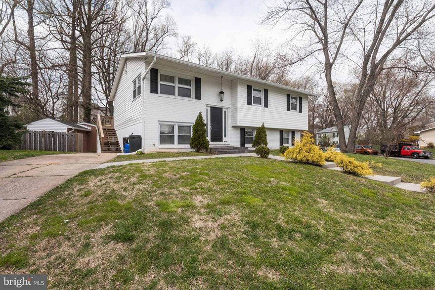 Seller Motivated! Bring an offer! Detached home with 5 Bedrooms and 3 Full baths - amazing high end finishes, wood floors, Fabulous open gourmet kitchen with granite counters & stainless appliances. Sliding glass door leads to a brand new deck to enjoy your summer with your  family. Master bedroom with  Full bath & SGD to deck, Large finished basement with  ceramic floors, 2nd master bath with sliding glass into the fenced back yard. Custom brick shed that can be convert into a cover garage or office/ workromm  space