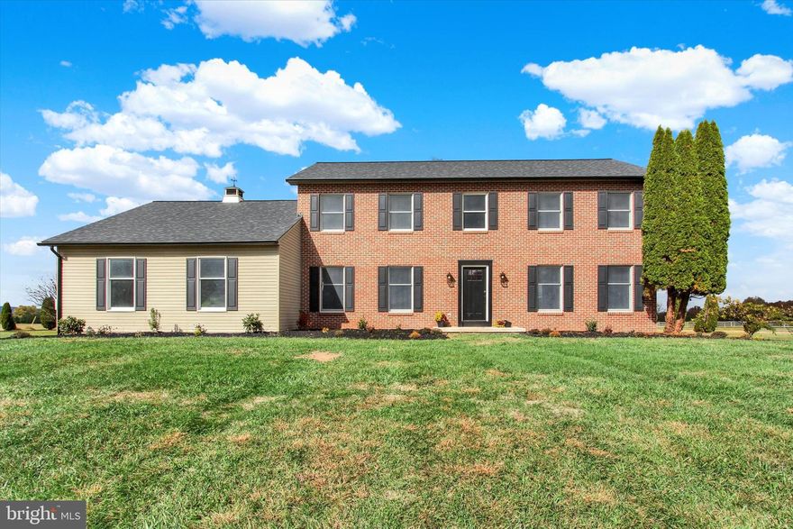 Spacious 5 BD, 3 BA Colonial on 2.76 acres in Mount Joy Township. Built in 1990 with over 2,700 sq. ft. of living space, this home offers multiple living areas, a custom layout, and a full basement for storage or future finish.  Enjoy peaceful country views, a large yard, and an attached 2-car garage. Brick and vinyl exterior, and a multi-tiered deck. Convenient Littlestown location with a private setting.