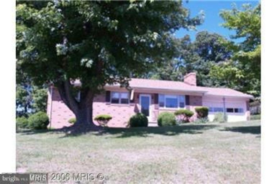 Lovely Brick Ranch boasts of 3 bedrooms, 1 full bath, I half bath sitting on over 1/2 acre. Large dining room opens onto deck overlooking views of farm, pond and wildlife. Updated kitchen with cherry cabinets appx 2000 sq ft of living space with partialfinished basement, room for storage, 1 car garage, 2 car garage converted to multi-purpose room with kitchen, additional parking with 10X20 shed
