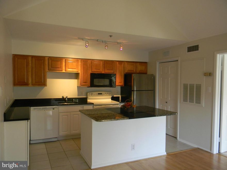 Location! Location! Location! Unit is in Move-in condition. New water heater, freshly painted with nice appliances. This bright unit is on the top floor, no neighbors on either side, storage room off balcony.  Free shuttle to Pentagon City Metro, off 395 to DC.